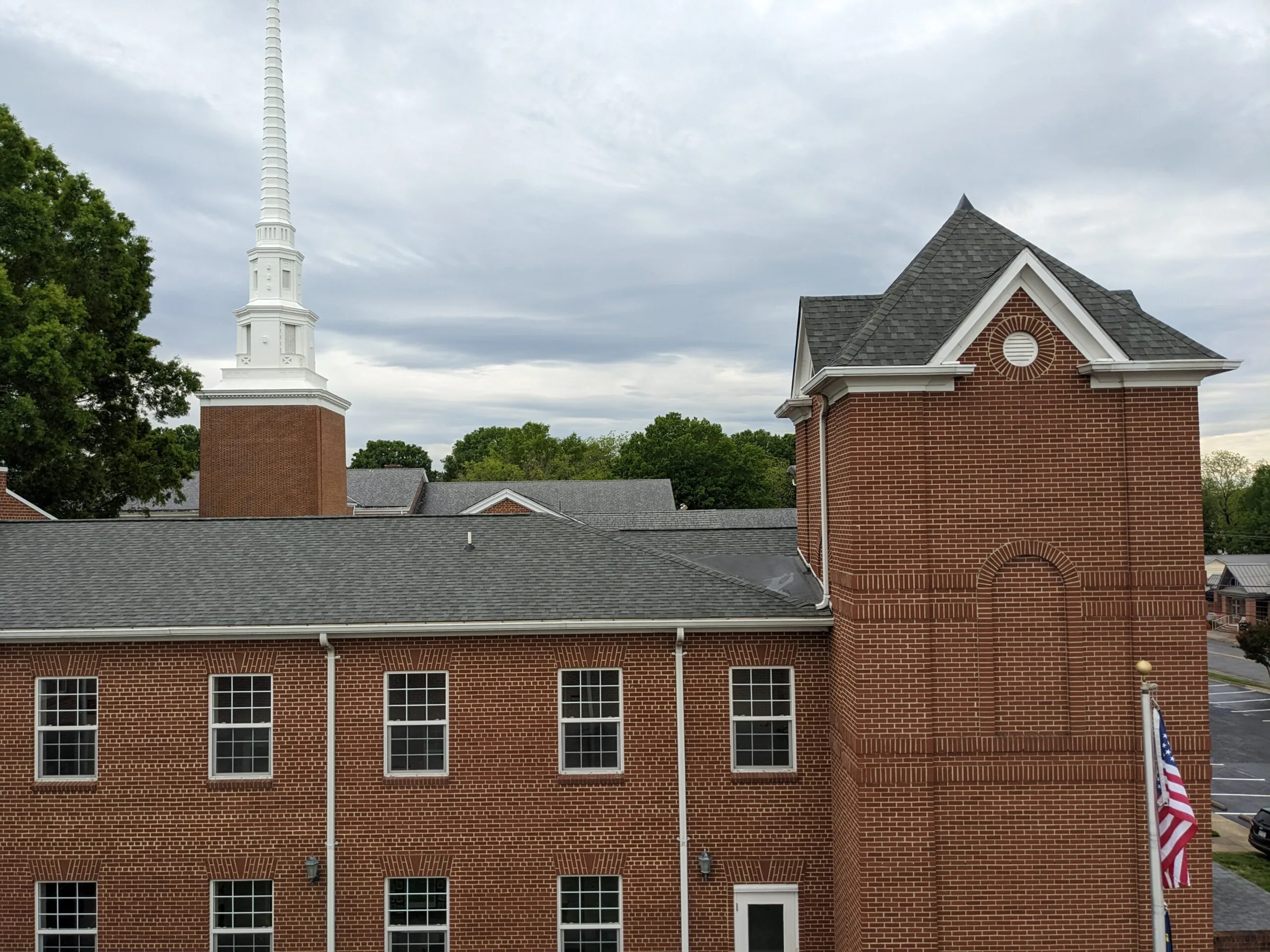 Church roof and brick facade