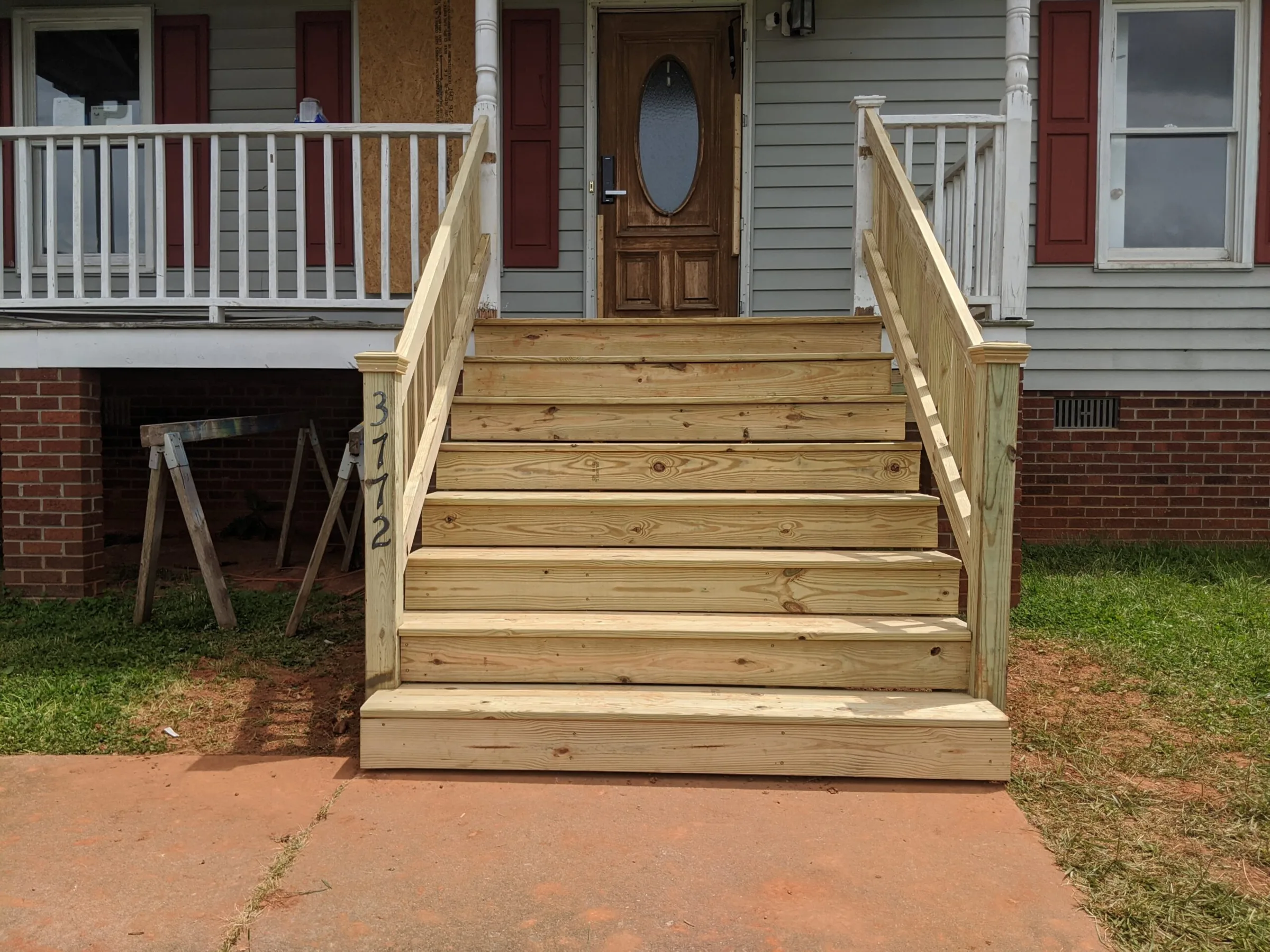 New wood stairs and deck at a residence